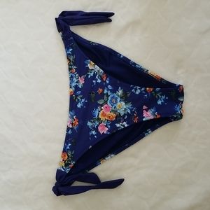 Never worn Floral bikini bottoms sz L blue